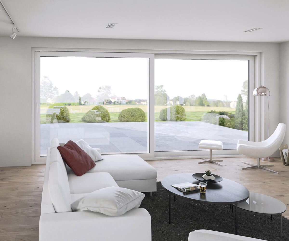 Technische Ausstattung von SYSTEM MASSIVHAUS - Große Fenster im Wohnzimmer